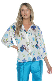 Decolteu în V feminin, completat de închidere cu nasturi scoică